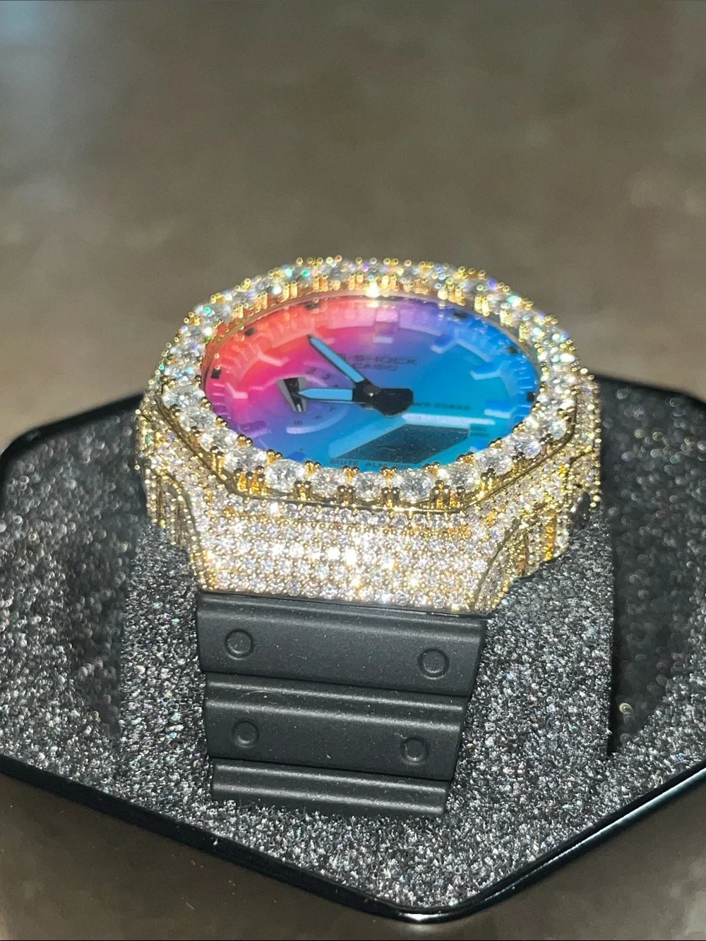 G-Shock Gold Bezel Watch with Pink-to-Blue Gradient Dial